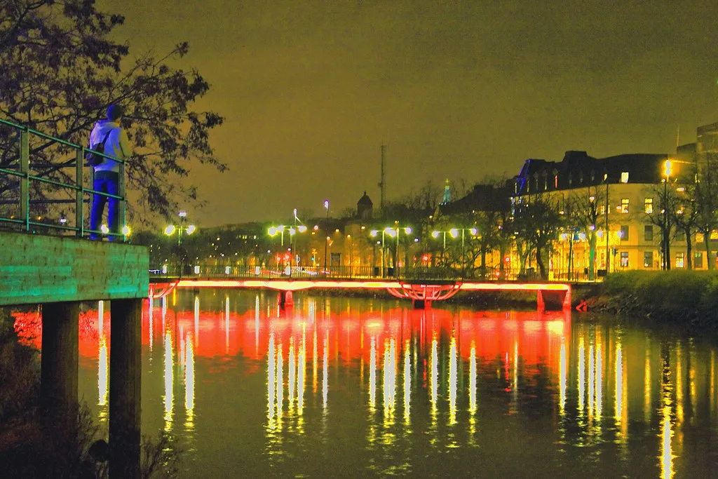 A canal bridge lit at night, Malmö.