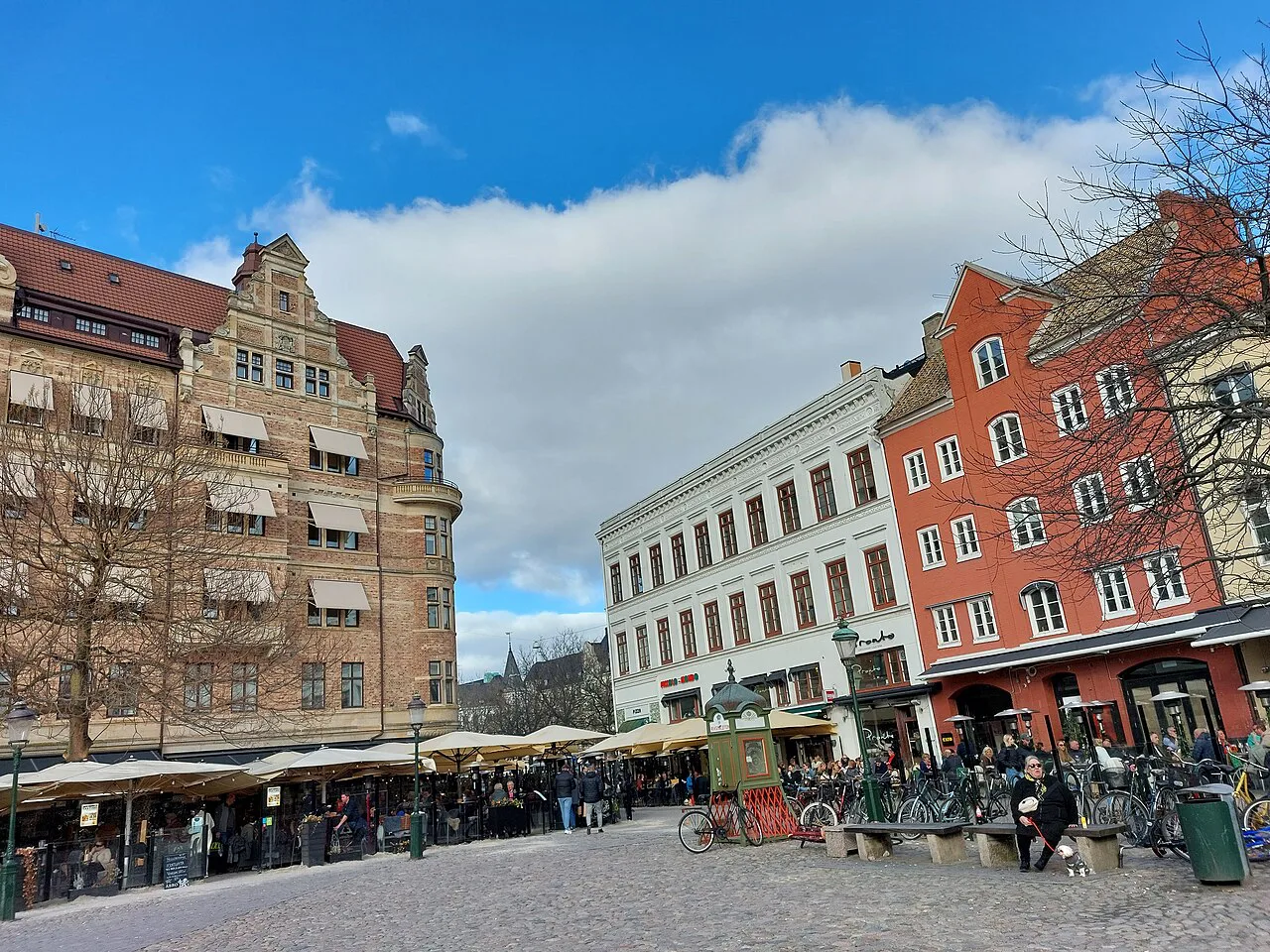 Market stalls and café terraces on Lilla Torg, Malmö.