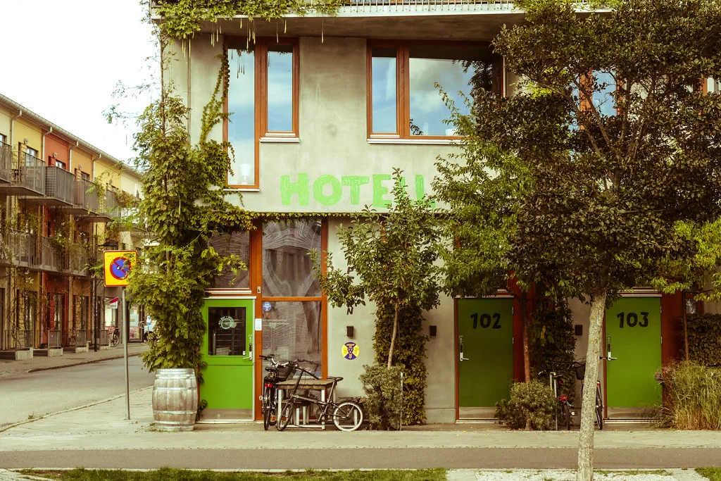 A green-fronted hotel in Malmö.