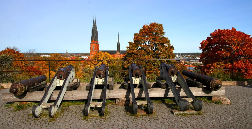 Cannons at Uppsala Castle with the cathedral behind.