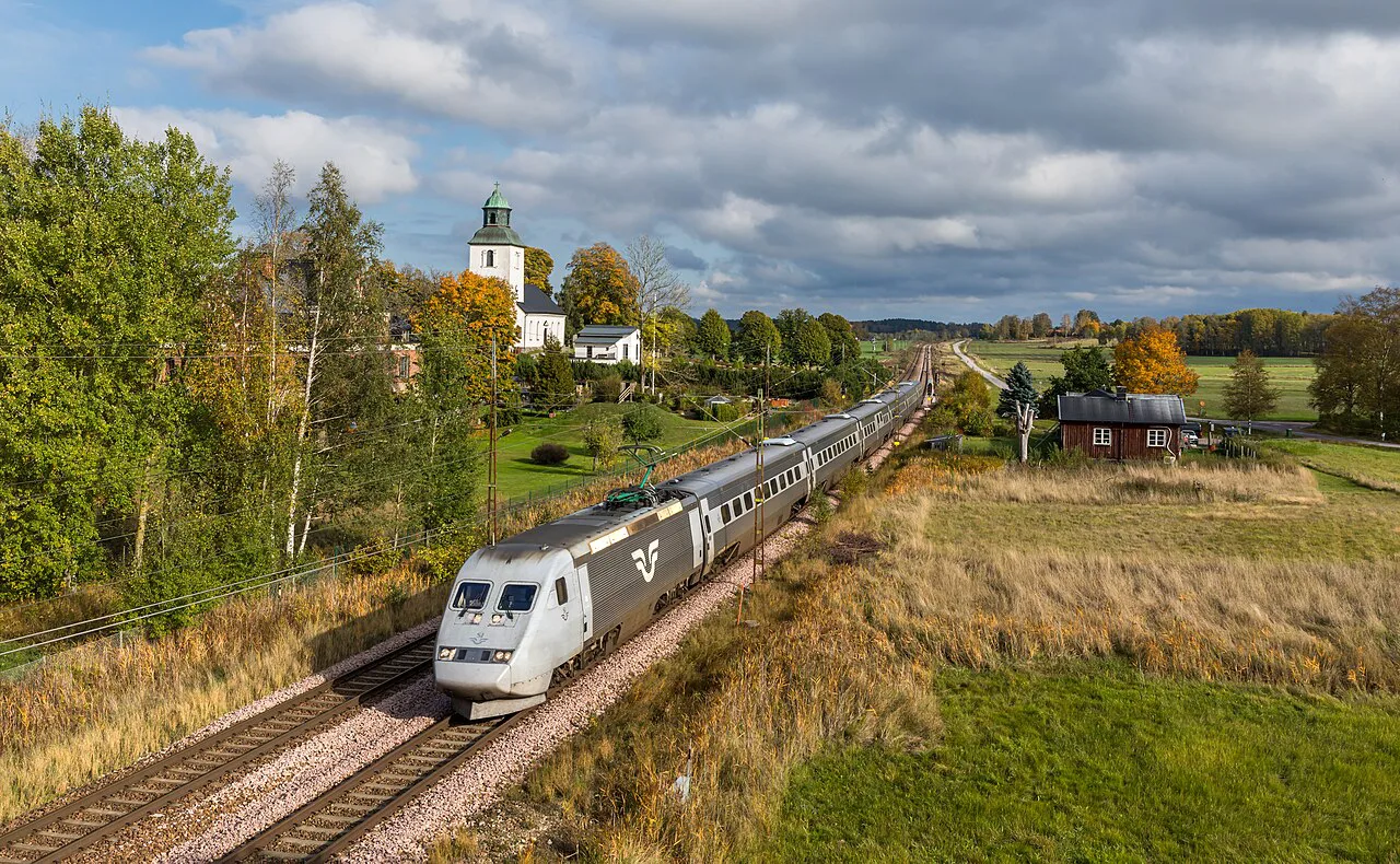 An SJ X2000 train crossing the Swedish countryside.