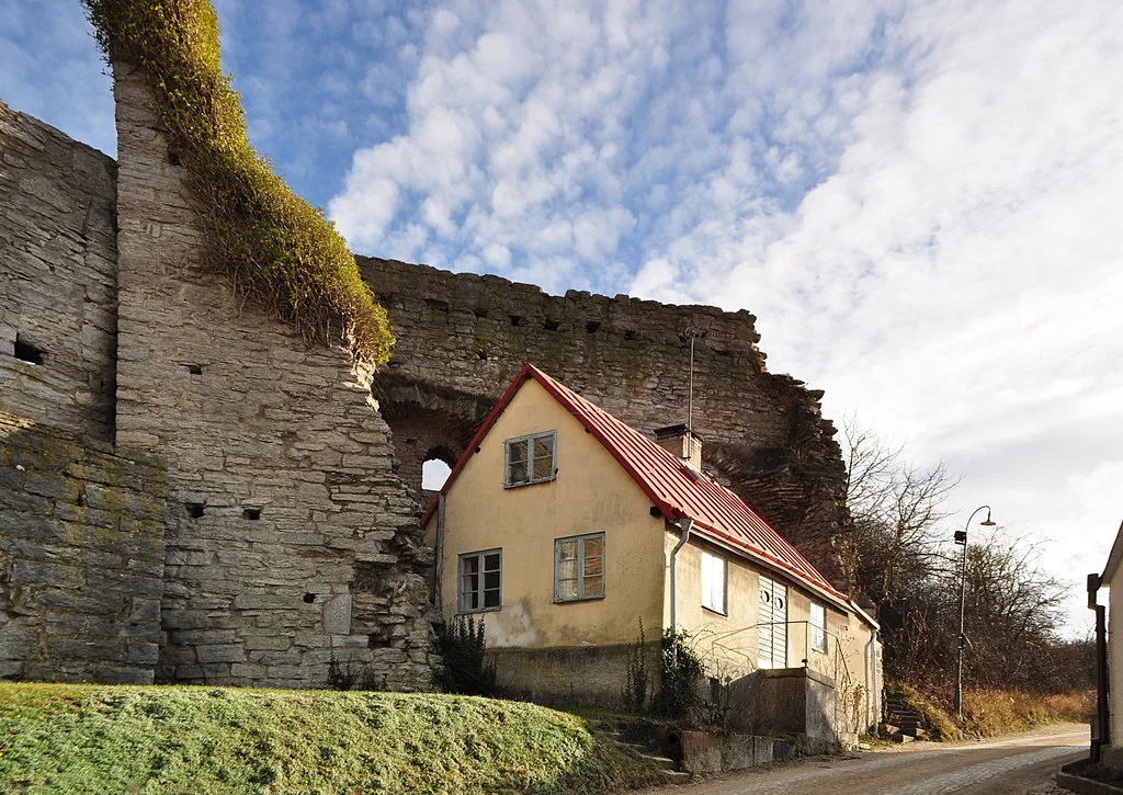 Visby's city wall beside a house on Nygatan, Gotland.
