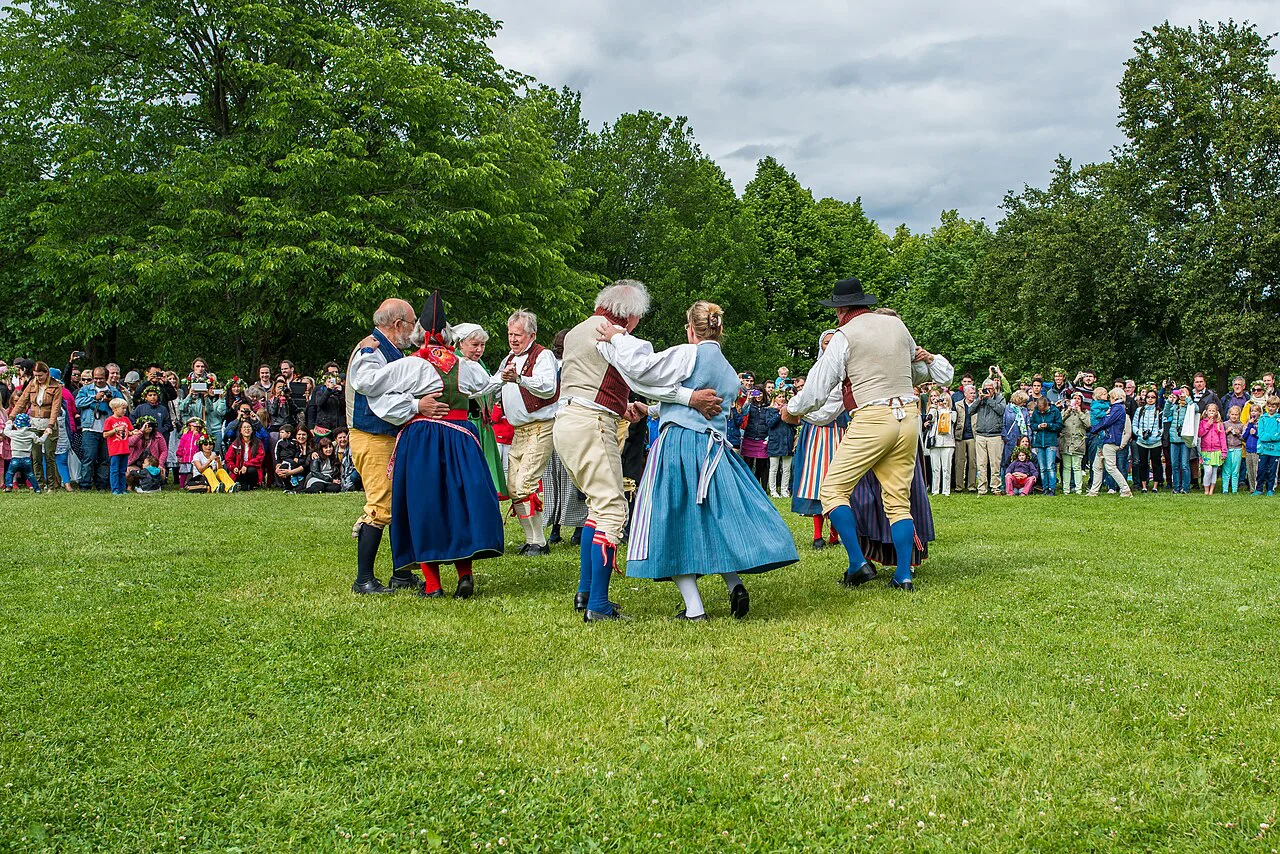 Folk dancing at a Midsummer celebration in Sweden.