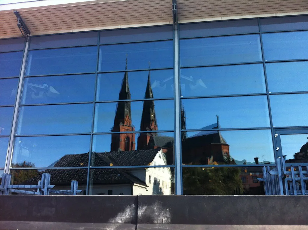 Uppsala Cathedral reflected in glass.